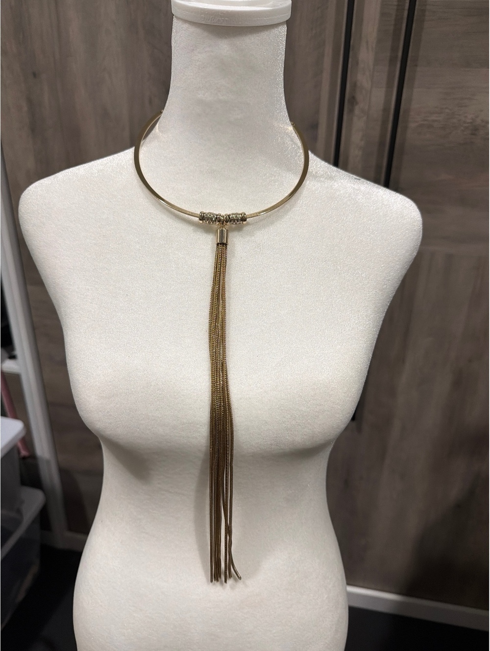 Gold Tone Statement Tassel Necklace with Adjustable Chain and Crystal Accent